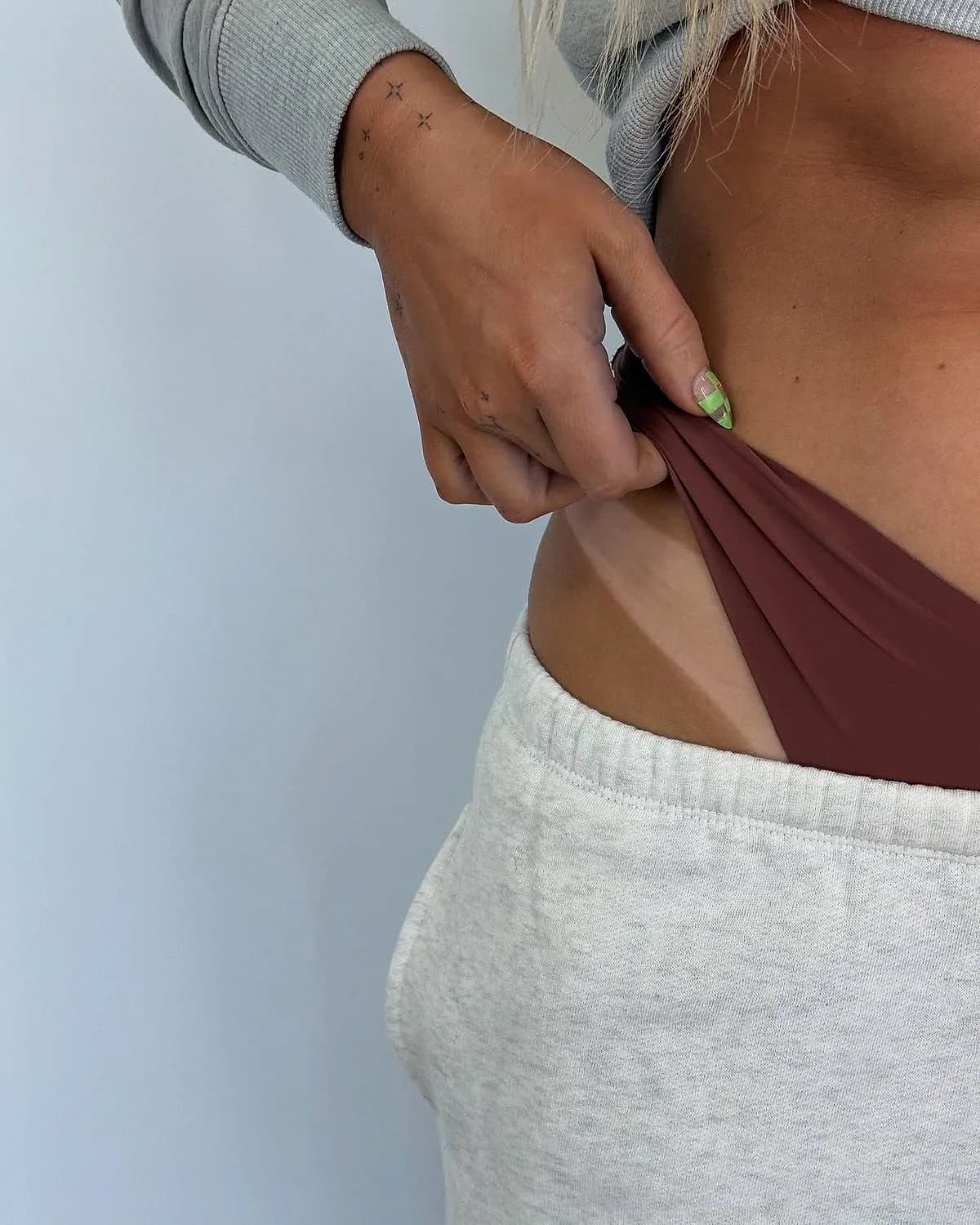 Real Glowtoure spray tan showing custom depth and a true-to-skin tan line